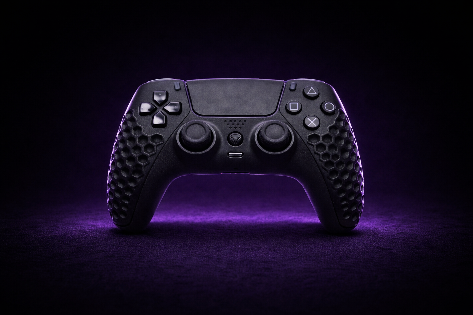Frontal close-up of the black Helico HexaVent HX-1 Core custom controller for PS5 and PC. The purple ambient light highlights the textured honeycomb ventilated grips and the precise action buttons.